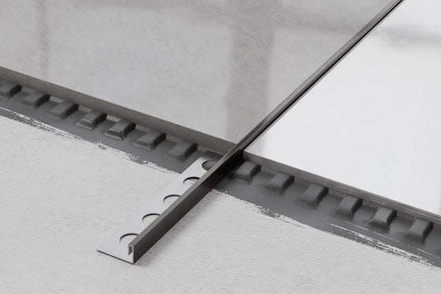 Perfil decorativo Js angular rectificado en acero inoxidable - Gunmetal