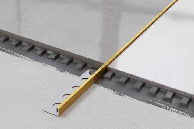 Profil décoratif en acier inoxydable satiné doré rectifié en JS angulaire