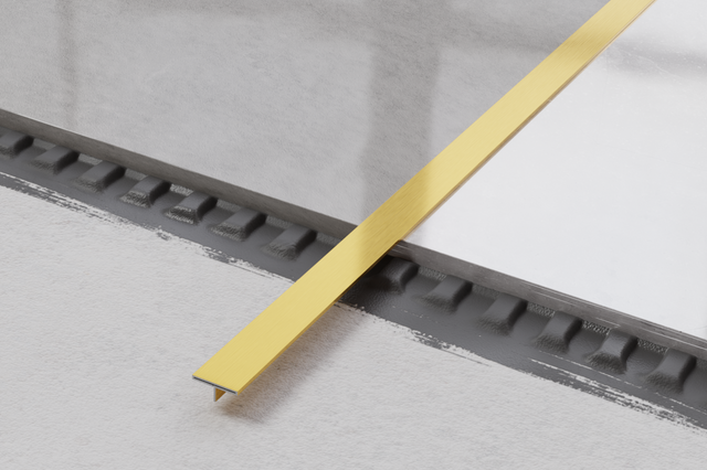 Profil décoratif Ts en acier inoxydable doré satiné pour couvrir les joints rectifiés