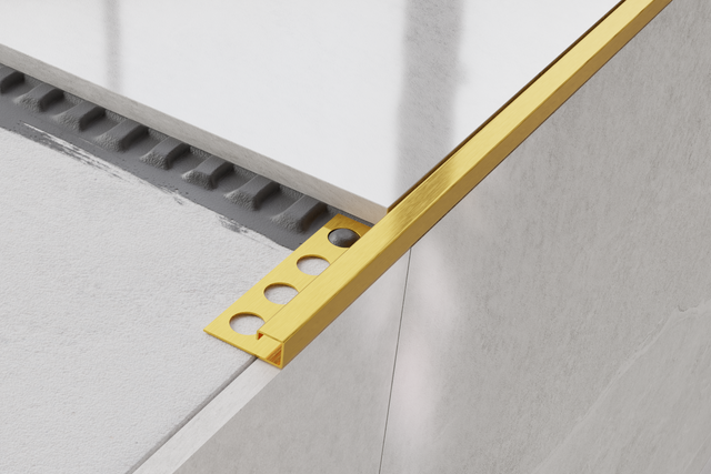 Profil décoratif d'angle en acier inoxydable satiné doré