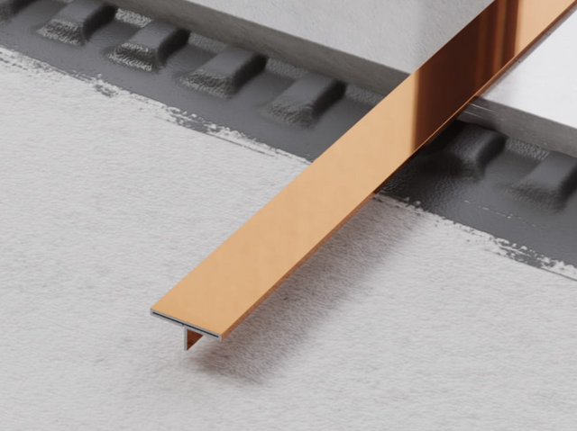 Perfil decorativo Ts cubrejunta rectificado en acero inoxidable cobre pulido