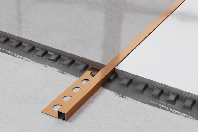 Profilé décoratif d'angle QS rectifié en acier inoxydable finition cuivre satiné