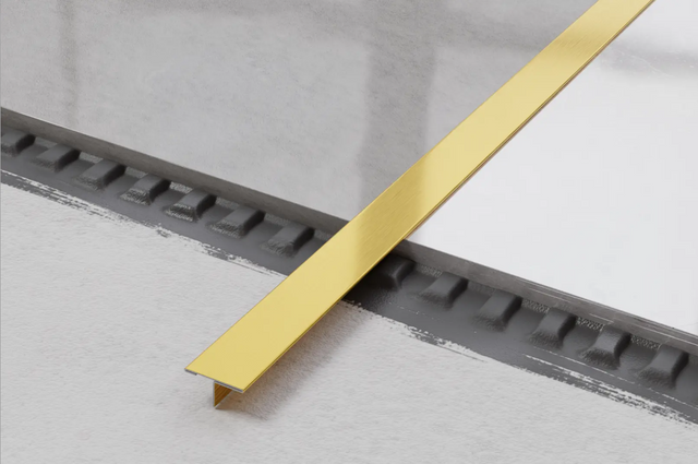 Profil décoratif en T avec couvercle de jonction en acier inoxydable satiné doré