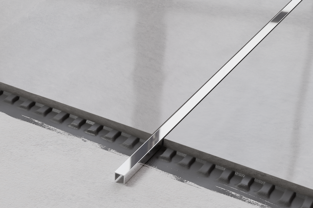 U profile connection in polished silver ground stainless steel