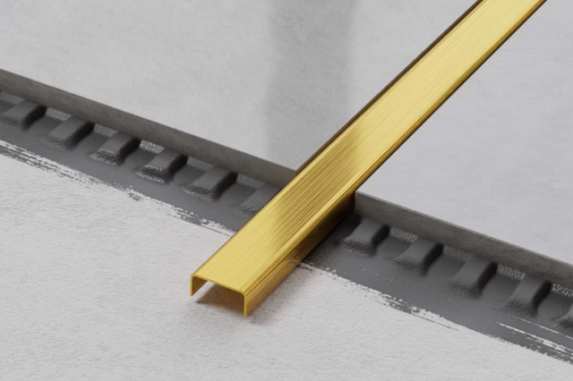 Connection profile C in satin gold stainless steel