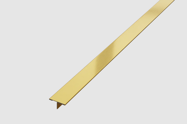 Decorative T-profile with stainless steel satin gold joint cover